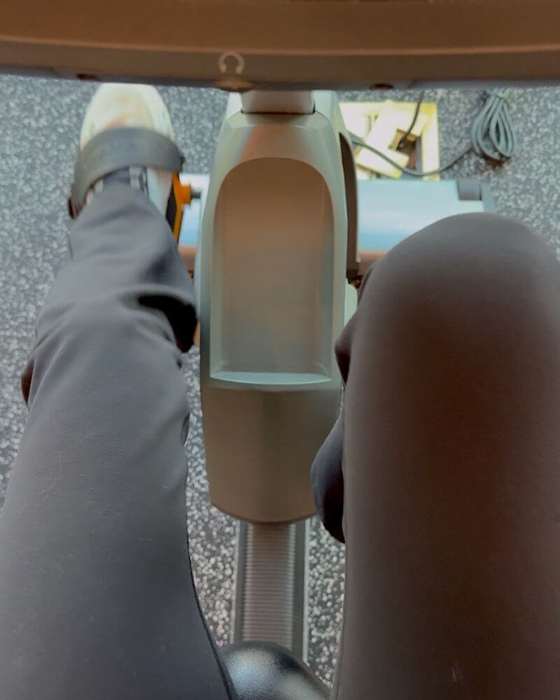 First person perspective of pedaling smoothly on a stationary bike