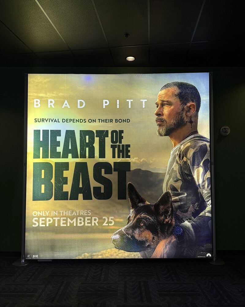 Heart of the Beast review for dog lovers: the movie poster showing Brad Pitt and Odin the German Shepherd