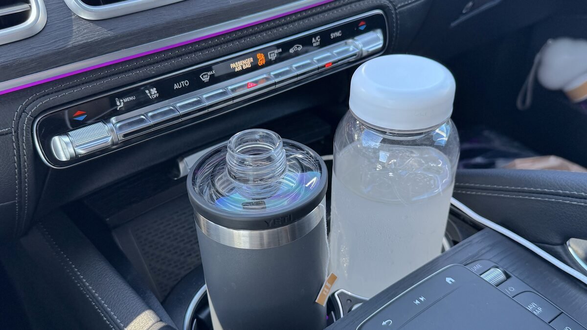 How to Cool Down After a Sauna Session When There Is No Shower A tumbler and a bottle of electrolyte water in the car cup holder during the last part of the cooldown