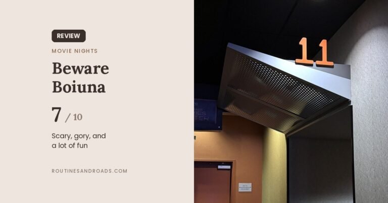 Beware Boiuna review card with a 7 out of 10 score next to the entrance of auditorium 11 at AMC