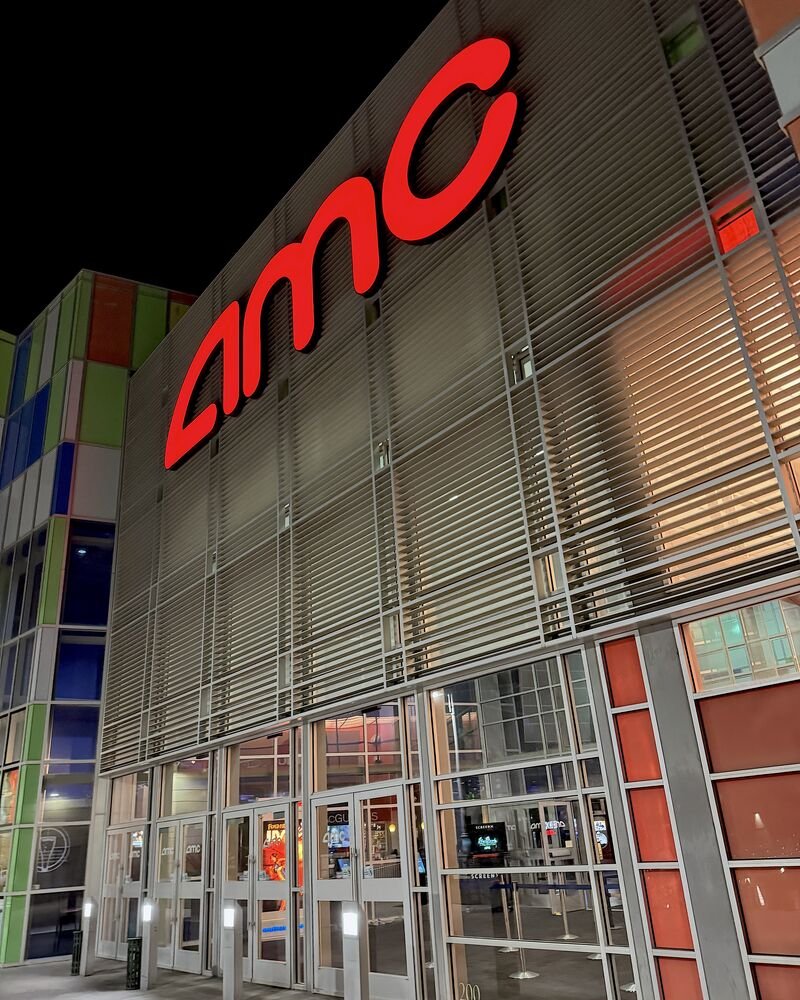 I Almost Skipped The Nightmare Before Christmas 3D. One Scene Changed My Mind Nightmare Before Christmas 3D night at the movies: a red AMC sign lit up on the theater at night