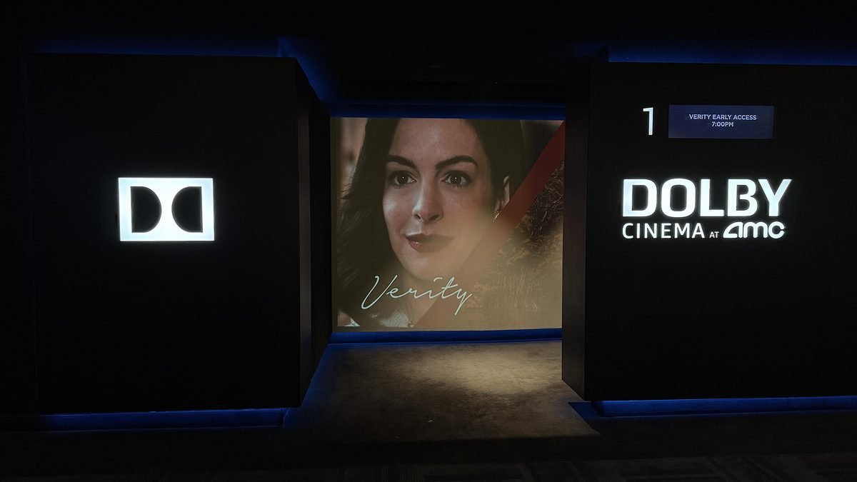Dolby Cinema entrance at AMC with a Verity display on the wall before the early access screening
