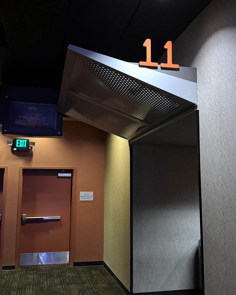 Is Beware Boiuna Worth Watching? 7/10 and Jump Scare Times (No Spoilers) Entrance to auditorium 11 with an orange number sign at AMC, where I watched Beware Boiuna
