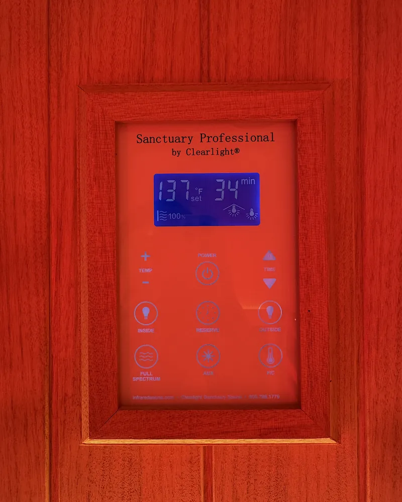 Infrared Sauna Cost: My $69.99 Membership vs Buying One (With Red Light) The Clearlight Sanctuary Professional control panel showing 137 degrees and 34 minutes left