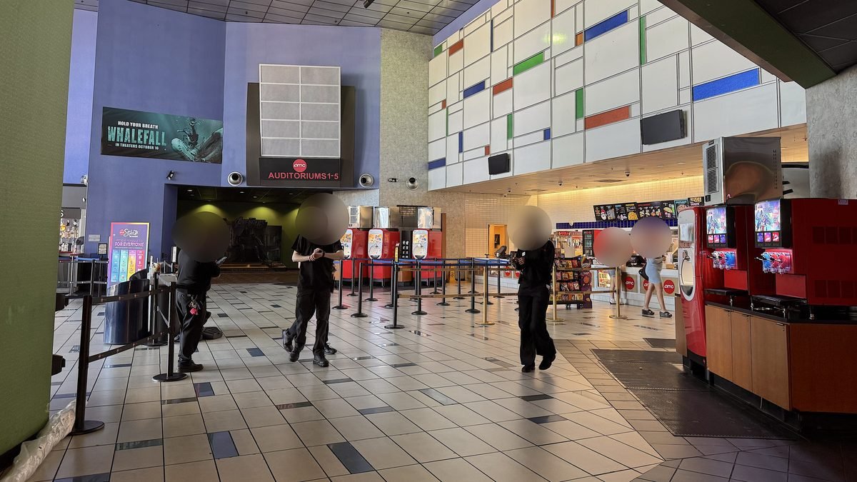 Is Beware Boiuna Worth Watching? 7/10 and Jump Scare Times (No Spoilers) AMC theater lobby with the concession stand and the hallway to auditoriums 1 to 5