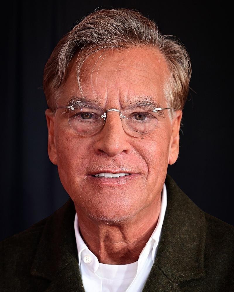 Is The Social Reckoning Worth Seeing? My 7.5/10 Review (No Spoilers) Writer and director Aaron Sorkin in glasses and a dark jacket at a press event in New York