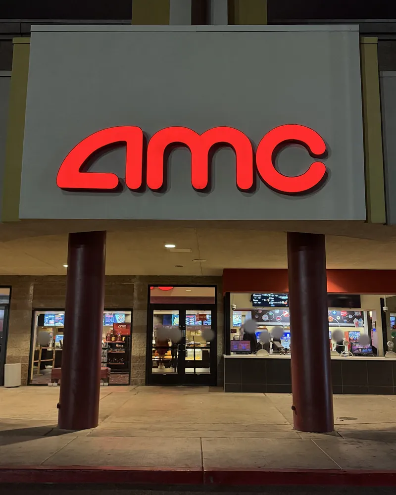Is The Social Reckoning Worth Seeing? My 7.5/10 Review (No Spoilers) Red AMC sign lit up on the front of the movie theater at night